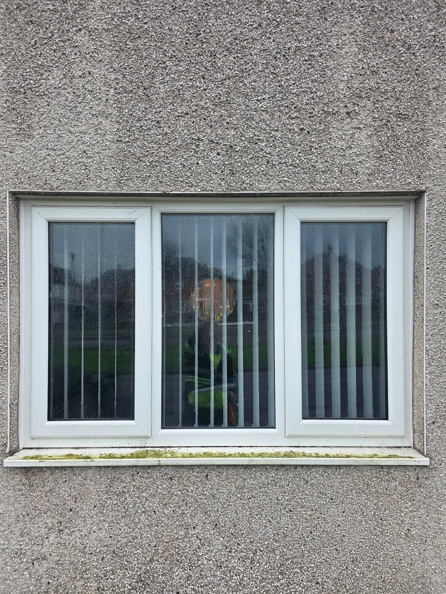 Window before exterior cleaning